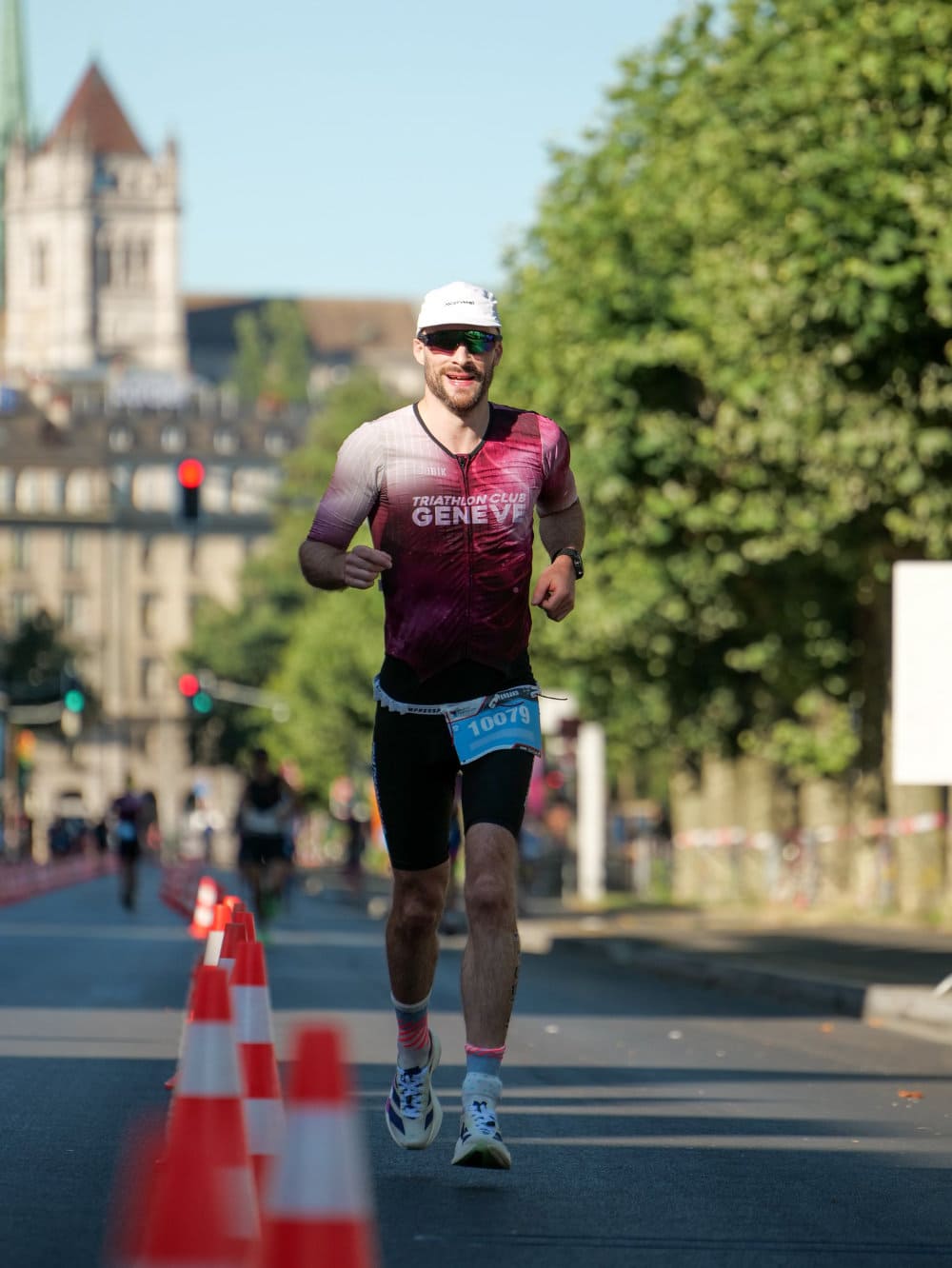 Matthias Perrot racing in a Triathlon Club de Geneve trisuit